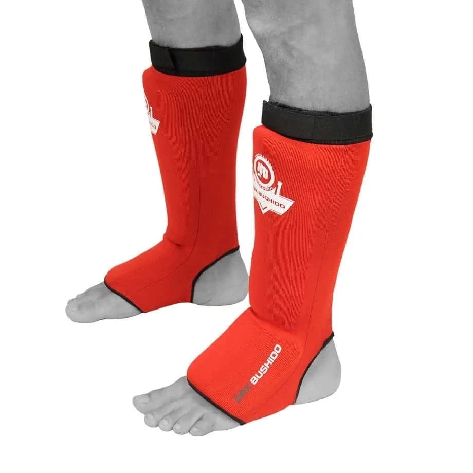 Ochraniacze piszczeli DBX Bushido Shinrage Red w czerwono-czarnej wersji